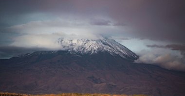Snow covers the peak of Mount Ağrı in Doğubayazıt, eastern Ağrı province, Türkiye, Sept. 11, 2025. (AA Photo)
