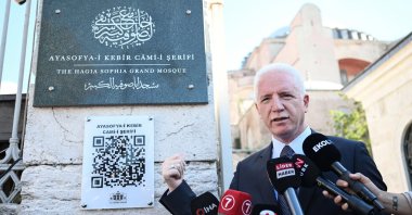 Istanbul Governor Davut Gül presents a QR code in front of Ayasofya Mosque as part of the &quot;Digital Istanbul&quot; project, Istanbul, Türkiye, Sept. 16, 2025. (AA Photo)