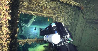 A handout shows a diver exploring the HMHS Britannic, a British hospital ship that sank near the Greek island of Kea in 1916 after hitting a mine during World War I, Greece, Sept. 15, 2025. (AFP Photo)
