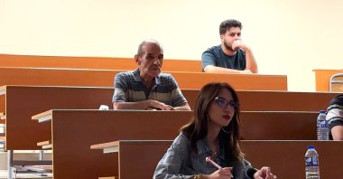 Hüseyin Tekerci (C), attends his first day at Karabük University surrounded by fellow students, Karabük, Türkiye, Sept. 16, 2025. (IHA Photo) 