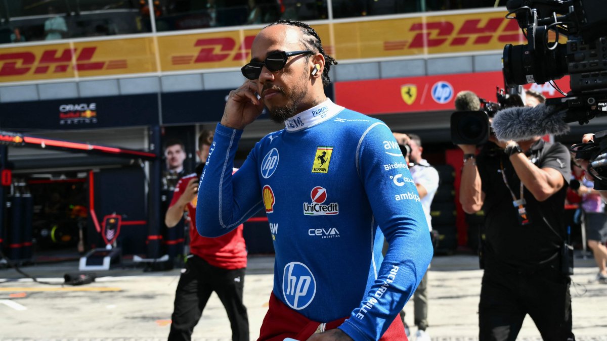 Ferrari&#039;s British driver Lewis Hamilton walks near the track before the first practice session ahead of the Italian Formula One Grand Prix at the Autodromo Nazionale Monza circuit, Monza, Italy, Sept. 5, 2025. (AFP Photo)