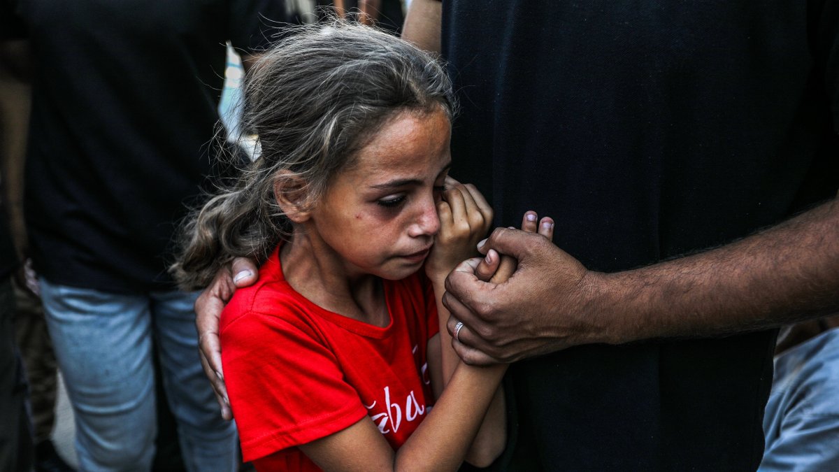 A Palestinian child mourns the death of loved ones in Rafah, southern Gaza, Palestine, Sept. 17, 2025. (AA Photo)