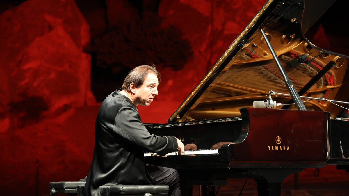 Renowned Turkish composer Fazıl Say performs on stage, Nevşehir, Türkiye, Sept. 6, 2025. (İHA Photo)