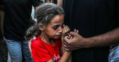 A Palestinian child mourns the death of loved ones in Rafah, southern Gaza, Palestine, Sept. 17, 2025. (AA Photo)