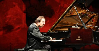 Renowned Turkish composer Fazıl Say performs on stage, Nevşehir, Türkiye, Sept. 6, 2025. (İHA Photo)