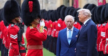 U.S. President Donald Trump and Britain&#039;s King Charles review the Guard of Honour after the arrival at Windsor Castle, in Windsor, U.K., Sept. 17, 2025. (Reuters Photo)