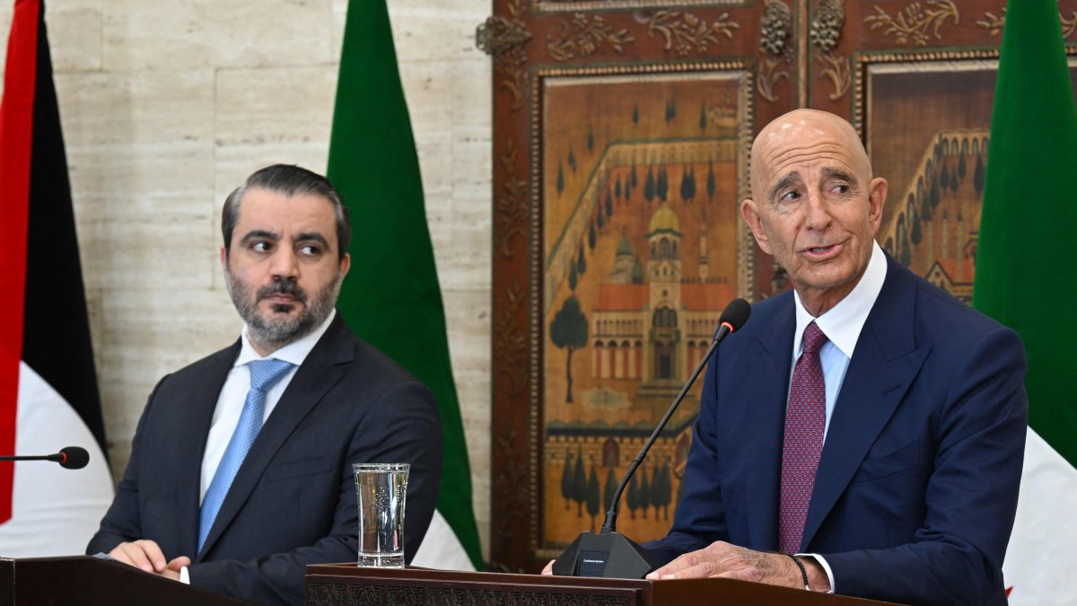 Syrian Foreign Minister Asaad al-Shaibani (L) watches as U.S. Special Envoy for Syria Tom Barrack speaks, Damascus, Syria, Sept. 16, 2025. (AFP Photo)
