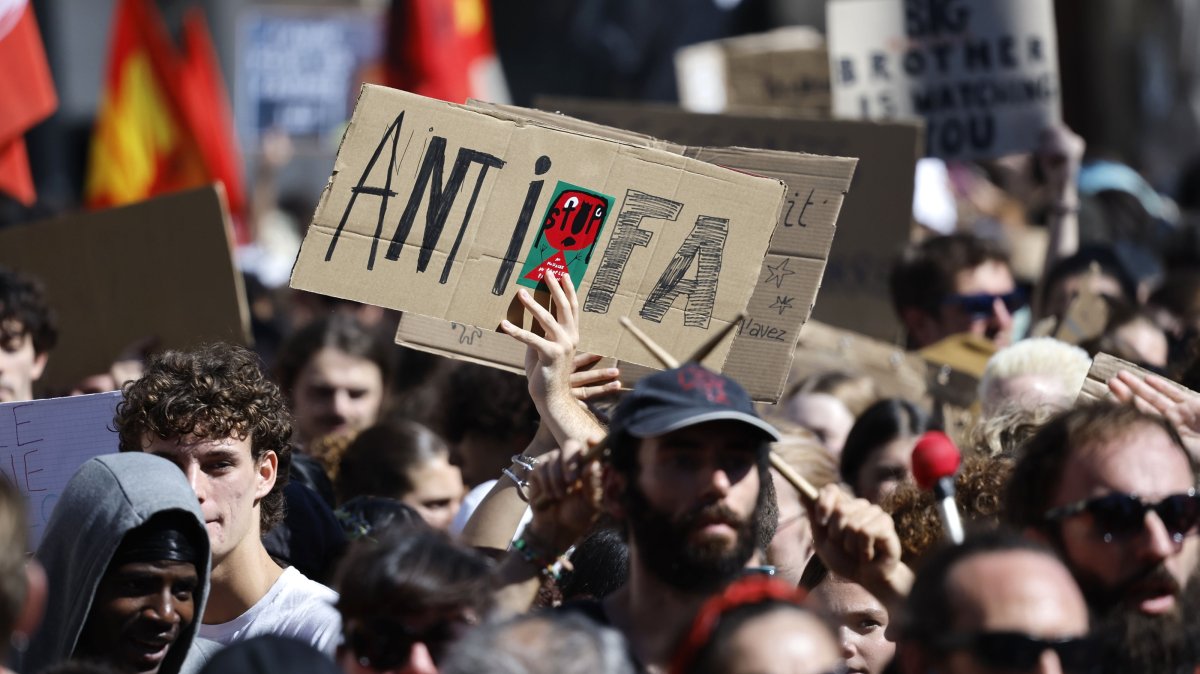 A protester holds a sign reading &quot;Antifa&quot; at a rally in Montpellier, France, Sept. 10, 2025. (EPA Photo)