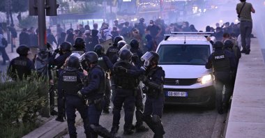 Riot police forces arrive to disperse protesters trying to block a road in Marseille, southeastern France, Sept.18, 2025. (AFP Photo)