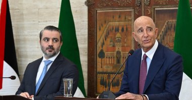 Syrian Foreign Minister Asaad al-Shaibani (L) watches as U.S. Special Envoy for Syria Tom Barrack speaks, Damascus, Syria, Sept. 16, 2025. (AFP Photo)