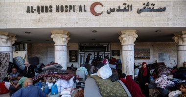 Palestinians displaced by Israeli attacks take shelter in the courtyard of Al-Quds Hospital, run by the Palestinian Red Crescent, in the Tel al-Hawa neighborhood of Gaza City, Gaza, Palestine, Sept. 16, 2025. (AA Photo)