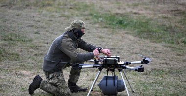 A serviceman works on a drone during the "Zapad-2025" (West-2025) joint Russian-Belarusian military drills at a training ground near the town of Borisov, east of the capital Minsk, Belarus, Sept. 15, 2025. (AFP Photo)