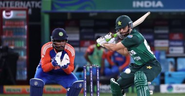 Pakistan&#039;s captain Salman Agha (R) plays a shot as India&#039;s wicketkeeper Sanju Samson watches during the Asia Cup 2025 Twenty20 international cricket match between India and Pakistan at the Dubai International Stadium, Dubai, UAE, Sept. 14, 2025. (AFP Photo)