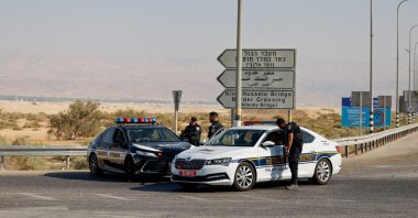 Israeli police officers stand next to their cars at the scene of a fatal shooting at the Allenby Crossing between the Israeli-occupied West Bank and Jordan, Sept.18, 2025. (Reuters Photo)
