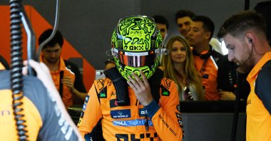 McLaren&#039;s British driver Lando Norris walks in his box in the pits during a practice session of the Formula One Azerbaijan Grand Prix at the Baku City Circuit, Baku, Azerbaijan, Sept. 19, 2025. (AFP Photo)