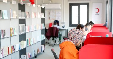 Students study at Kızılay’s 100th Year Library, preparing for exams in the earthquake-affected region, Adana, Türkiye, Sept. 19, 2025. (DHA Photo)