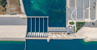 This undated photo shows an aerial view of dam structure and hydroelectric power plant in the Birecik district of Şanlıurfa province, southeastern Türkiye. (Shutterstock Photo)