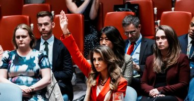 U.S. deputy Middle East envoy Morgan Ortagus (C) raises her hand to veto a draft resolution during a United Nations Security Council meeting on the situation in Gaza, at UN headquarters, New York, U.S., Sept. 18, 2025. (AFP Photo)