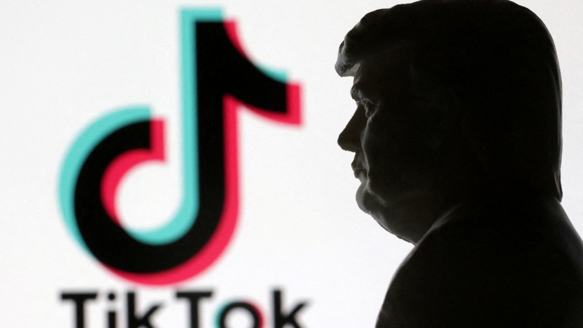 A 3D-printed miniature model of U.S. President Donald Trump and TikTok logo are seen in this illustration created on Jan. 15, 2025. (Reuters Photo)