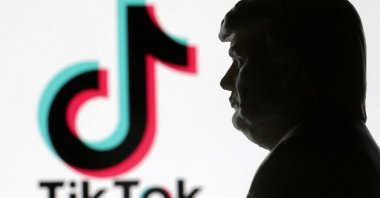 A 3D-printed miniature model of U.S. President Donald Trump and TikTok logo are seen in this illustration created on Jan. 15, 2025. (Reuters Photo)