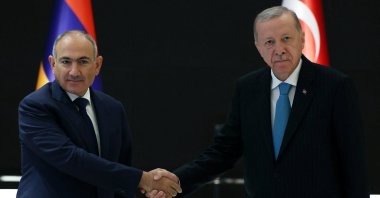 President Tayyip Erdoğan shakes hands with Armenia&#039;s Prime Minister Nikol Pashinyan (R) during a meeting on the sidelines of the Shanghai Cooperation Organisation (SCO) Summit in Tianjin, China, Sept. 1, 2025. (Reuters Photo)