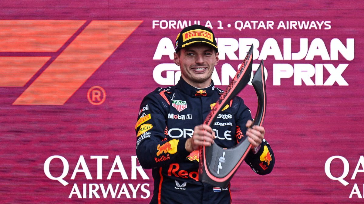 Red Bull Racing&#039;s Dutch driver Max Verstappen celebrates with his trophy after winning the Azerbaijan GP, Baku, Azerbaijan, Sept. 21, 2025. (AFP Photo)