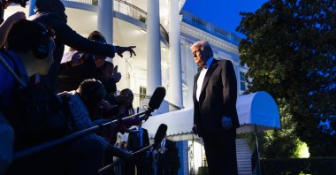 U.S. President Donald Trump speaks to reporters before he departs the White House for a private dinner at Mount Vernon, Washington, U.S., Sept. 20, 2025. (EPA Photo)