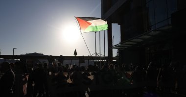 Demonstrators wave a Palestinian flag in east London, U.K., Sept. 9, 2025. (AFP Photo)
