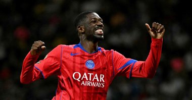 PSG&#039;s Ousmane Dembele celebrates scoring in a French L1 match against Toulouse FC, in Toulouse, southwestern France, Aug. 30, 2025. (AFP Photo)