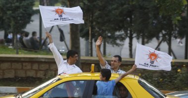Supporters of the AK Party wave the party&#039;s flags, Istanbul, Türkiye, June 12, 2011. (AP Photo)