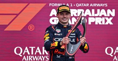 Red Bull Racing&#039;s Dutch driver Max Verstappen celebrates with his trophy after winning the Azerbaijan GP, Baku, Azerbaijan, Sept. 21, 2025. (AFP Photo)