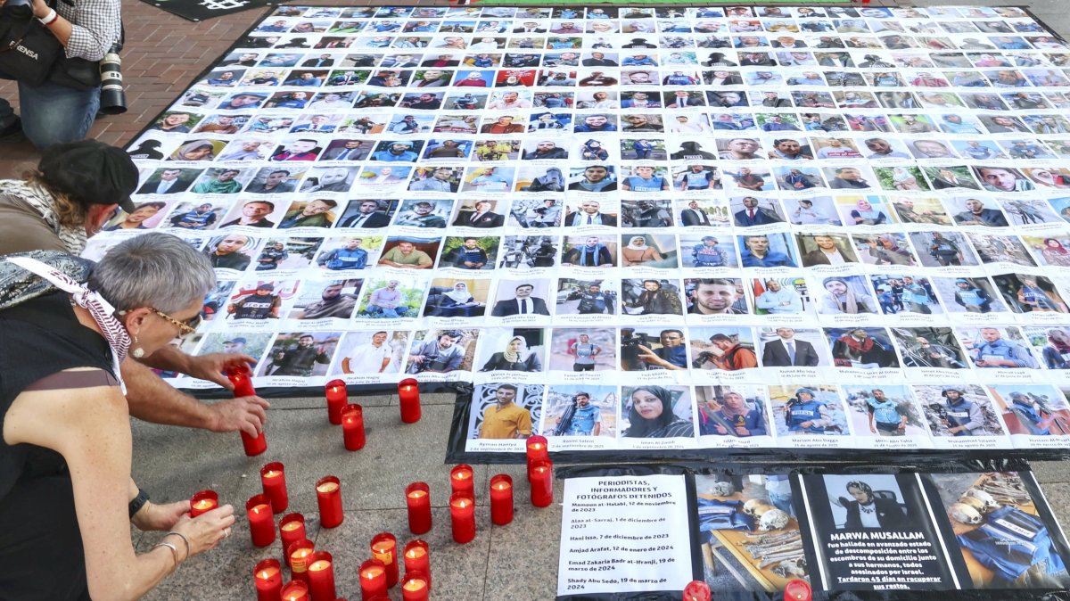 People pay tribute and remember the 302 journalists, reporters, photographers and cameramen killed in Gaza, during a rally, Logrono, La Rioja, Spain, Sept. 13, 2025. (EPA Photo)