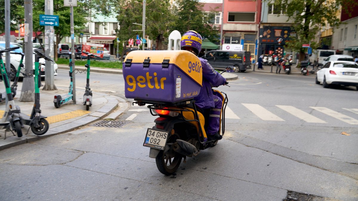 A Getir courier rides through the streets of Istanbul, Türkiye, Sept. 2, 2024. (Reuters Photo)