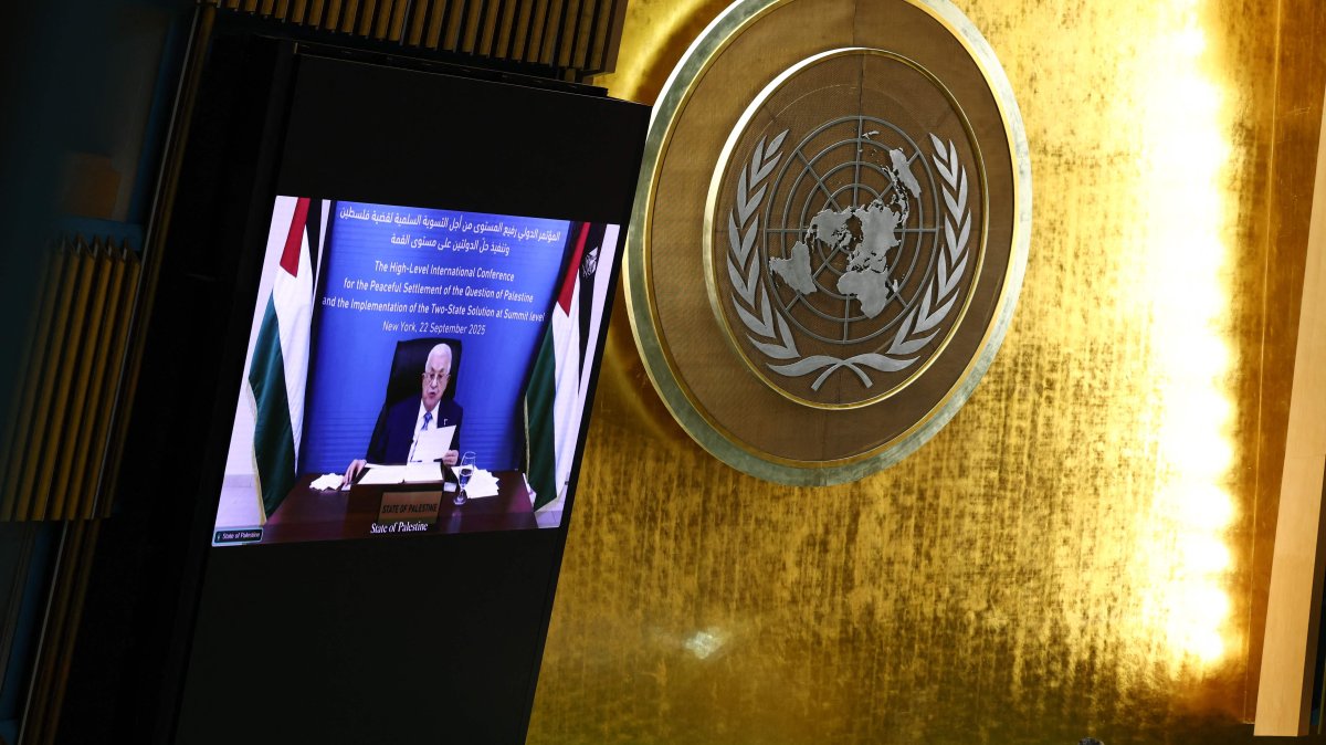 Palestinian Authority President Mahmud Abbas is displayed on a screen as he speaks remotely during a United Nations Summit on Palestinians at U.N. headquarters during the United Nations General Assembly (UNGA) in New York, Sept. 22, 2025. (AFP Photo)