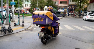 A Getir courier rides through the streets of Istanbul, Türkiye, Sept. 2, 2024. (Reuters Photo)