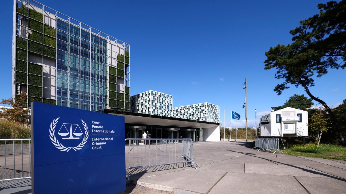 People stand outside the International Criminal Court (ICC), in The Hague, Netherlands, Sept. 22, 2025. (Reuters Photo)