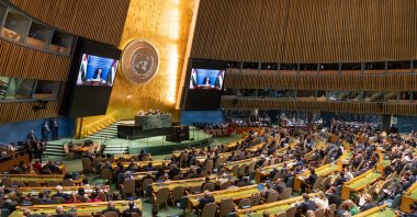 President of the State of Palestine Mahmoud Abbas (on screen) addresses via video-link to the International Conference, at U.N. headquarters, New York, U.S., Sept. 22, 2025. (EPA Photo)