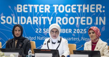 First lady Emine Erdoğan (C) speaks at the U.N. event on family, with Family and Social Services Minister Mahinur Özdemir Göktaş (R) and Qatari Social Development and Family Minister Buthaina bint Ali Al Jabr Al Nuaimi (L), New York, U.S, Sept. 22, 2025. (AA Photo)
