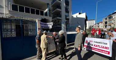 Activists leave a black wreath outside the Greek Consulate, Edirne, northwestern Türkiye, Sept. 23, 2025. (DHA Photo)