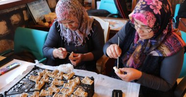 Local women work on sculptures near the ancient Roman city of Sagalassos, Burdur, southern Türkiye, Aug. 29, 2025. (AA Photo)