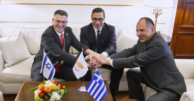 (L to R) Israel&#039;s Foreign Minister Gideon Sa&#039;ar, Greek Cypriot administration foreign minister Constantinos Kombos and Greek Foreign Minister Giorgos Gerapetritis shake hands during a meeting on energy cooperation, Athens, Greece, March 13, 2025. (AP Photo)