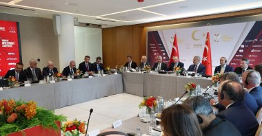 Energy and Natural Resources Minister Alparslan Bayraktar (5th-L) listens as President Recep Tayyip Erdoğan speaks at the Türkiye-U.S. Business Council investment conference, New York, U.S., Sept. 22, 2025. (AA Photo)