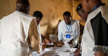 Guinean election officials count ballots at the Amie School polling station in Conakry, Guinea, Sept. 21, 2025. (AFP Photo)