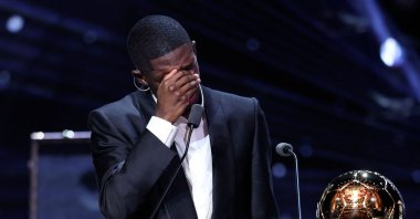 Paris Saint-Germain&#039;s Ousmane Dembele reacts after receiving the Ballon d&#039;Or award during the 2025 Ballon d&#039;Or France Football award ceremony at the Theatre du Chatelet, Paris, France, Sept. 22, 2025. (AFP Photo)