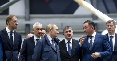 Russian President Vladimir Putin (C), accompanied by First Deputy Prime Minister Denis Manturov (L), Defence Minister Andrei Belousov (2nd-L) and Perm Territory Governor Dmitry Makhonin (3d-R) and Technodinamika Director General Igor Nasenkov (2nd-R), tours the exhibition of weapons and military equipment as he visits the Motovilikha Plants defense enterprise in Perm, Russia, Sept. 19, 2025. (EPA Photo)