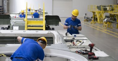 Technicians work on components at BMC's production facility, where mass production of Türkiye's indigenous Altay main battle tank is underway, Ankara, Türkiye, Sept. 4, 2025. (AA Photo)