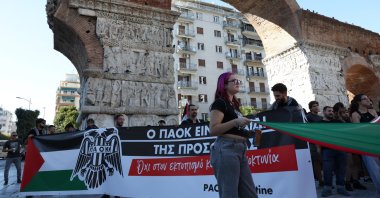PAOK fans hold a Palestine flag during a protest against Israeli club Maccabi Tel Aviv ahead of their Europa League match, Thessaloniki, Greece, Sept. 24, 2025. (Reuters Photo)