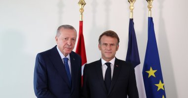 President Recep Tayyip Erdoğan and French President Emmanuel Macron shake hands as they meet in New York, Sept. 24, 2025. (AA Photo)