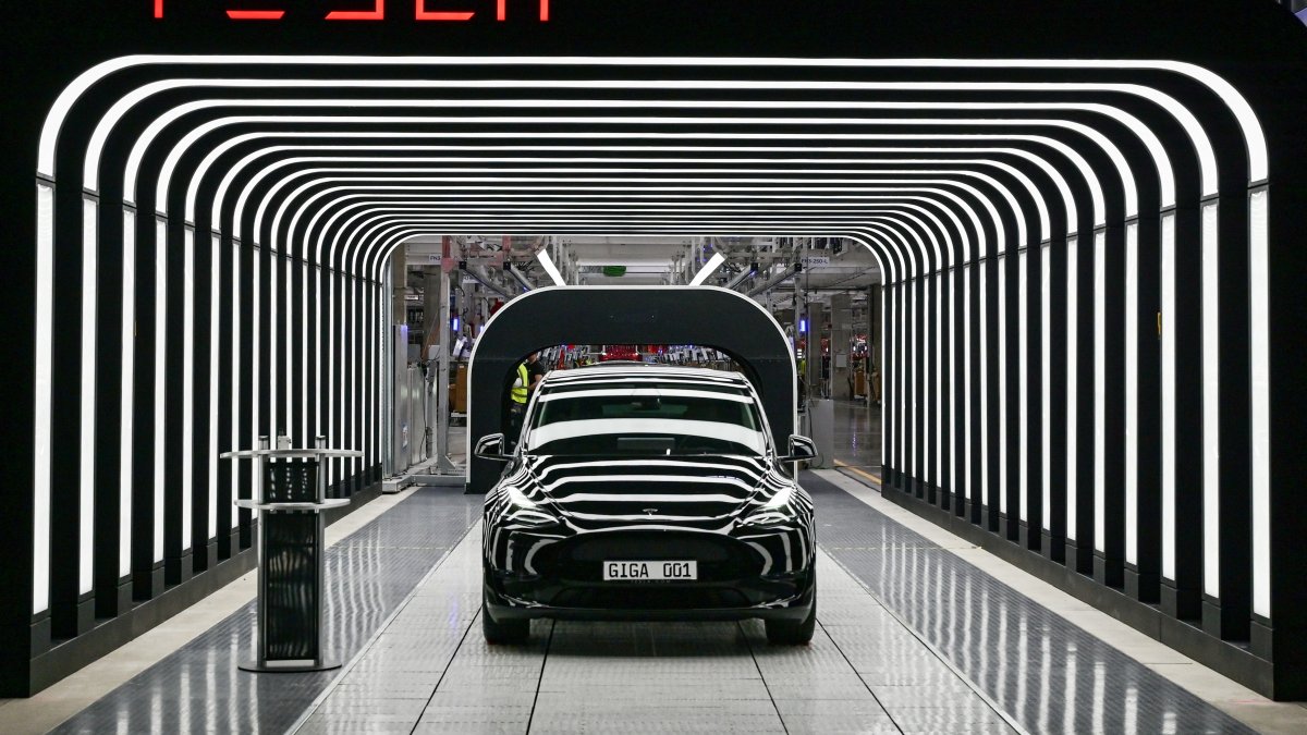 Model Y cars are pictured during the opening ceremony of the new Tesla Gigafactory for electric cars in Gruenheide, Germany, March 22, 2022. (Reuters Photo)