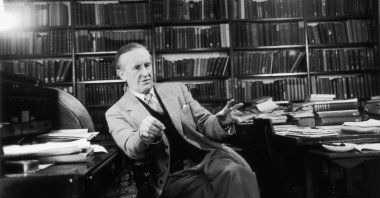 J.R.R. Tolkien, the British writer and scholar famed for "The Hobbit" and the epic fantasy "The Lord of the Rings," is interviewed in his Oxford office, U.K., Dec. 2, 1955. (Getty Images Photo)